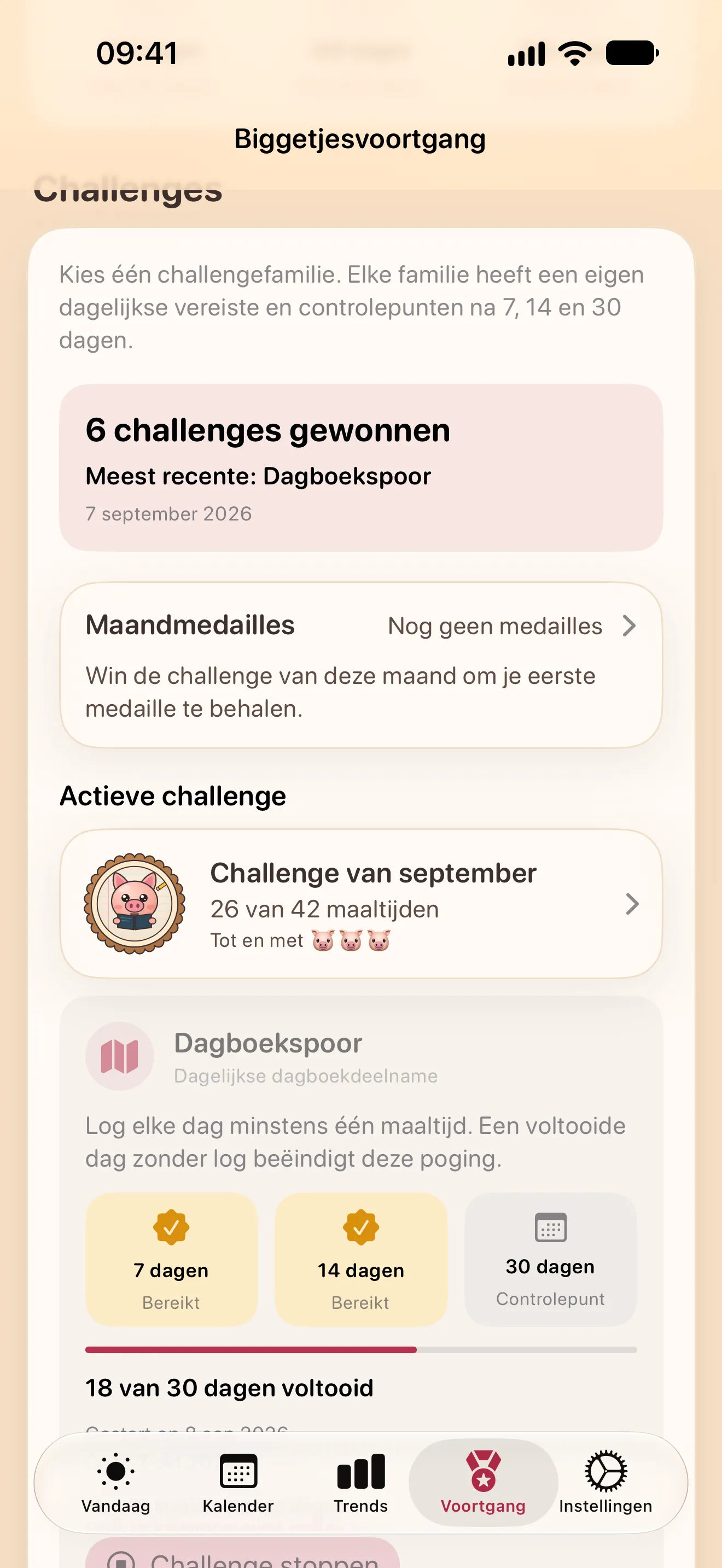Het scherm Voortgang: gewonnen challenges, de maandmedailles, de challenge van deze maand en een actieve challenge Dagboekspoor met controlepunten