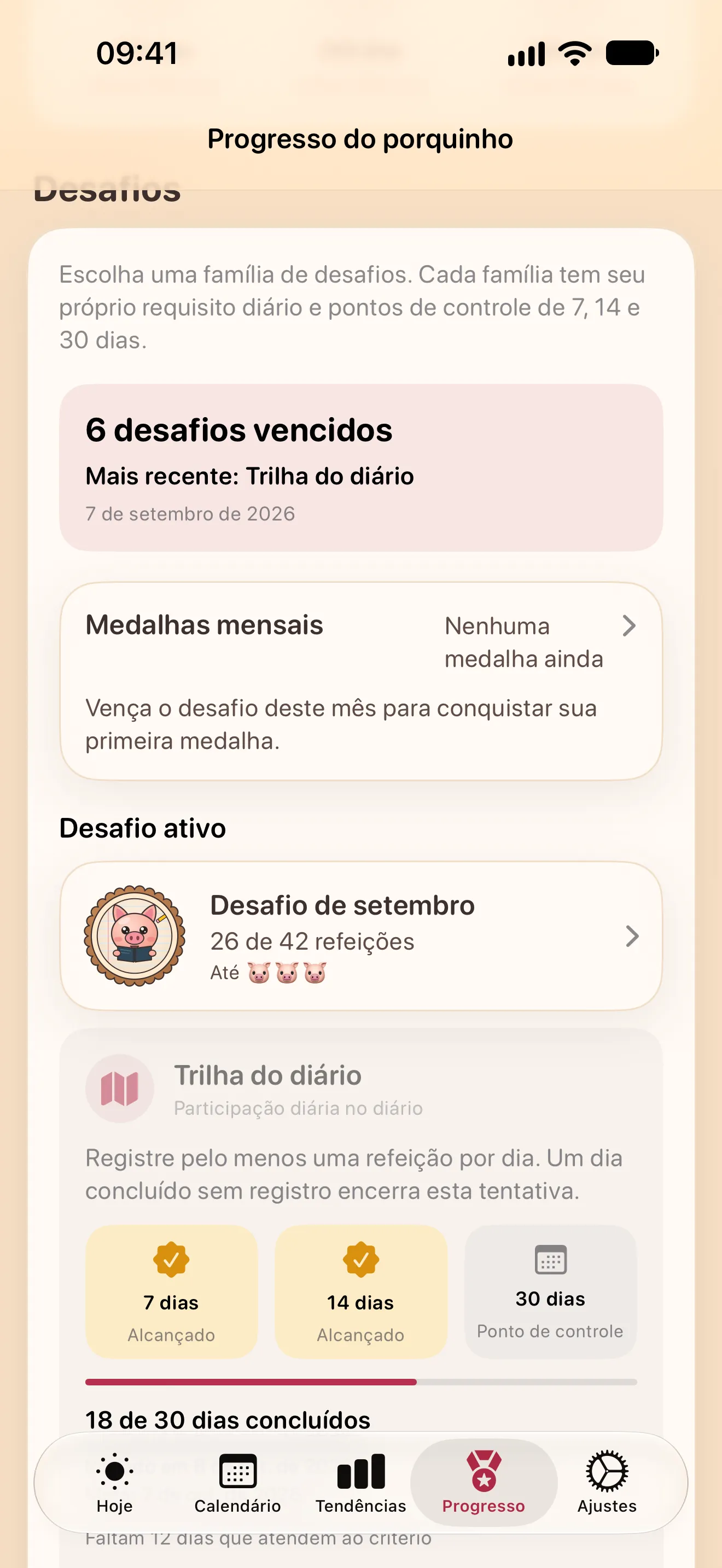 A tela Progresso: desafios vencidos, as medalhas mensais, o desafio do mês e um desafio Trilha do diário ativo com seus marcos